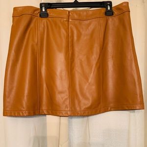COPY - A brown/caramel leather Gianni Bini skirt.